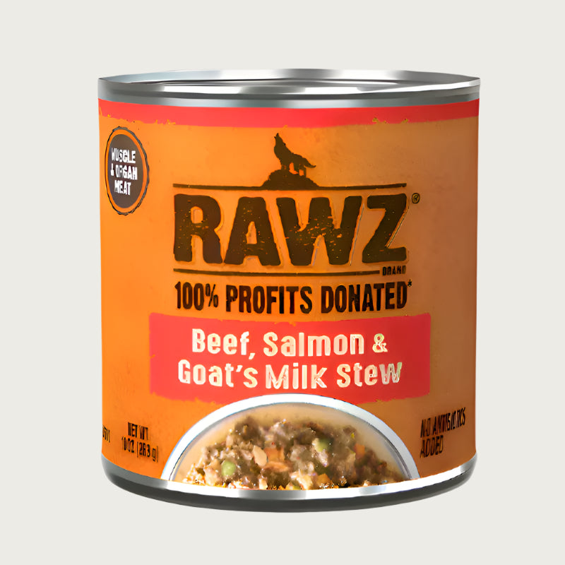 10 oz can of RAWZ Beef, Salmon & Goat's Milk Stew dog food. 100% profits donated. Muscle & organ meat, no antibiotics added. Label is orange with coral accents. Small photo at bottom shows a partial bowl of food, with crumbled meats and some green & orange vegetables.