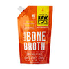 Raw Dynamic Bison Bone Broth for dogs in a 12 oz orange pouch, featuring pasture raised bison. Fortified with species-specific probiotics to promote overall gut health. Treat or meal topper for dogs.