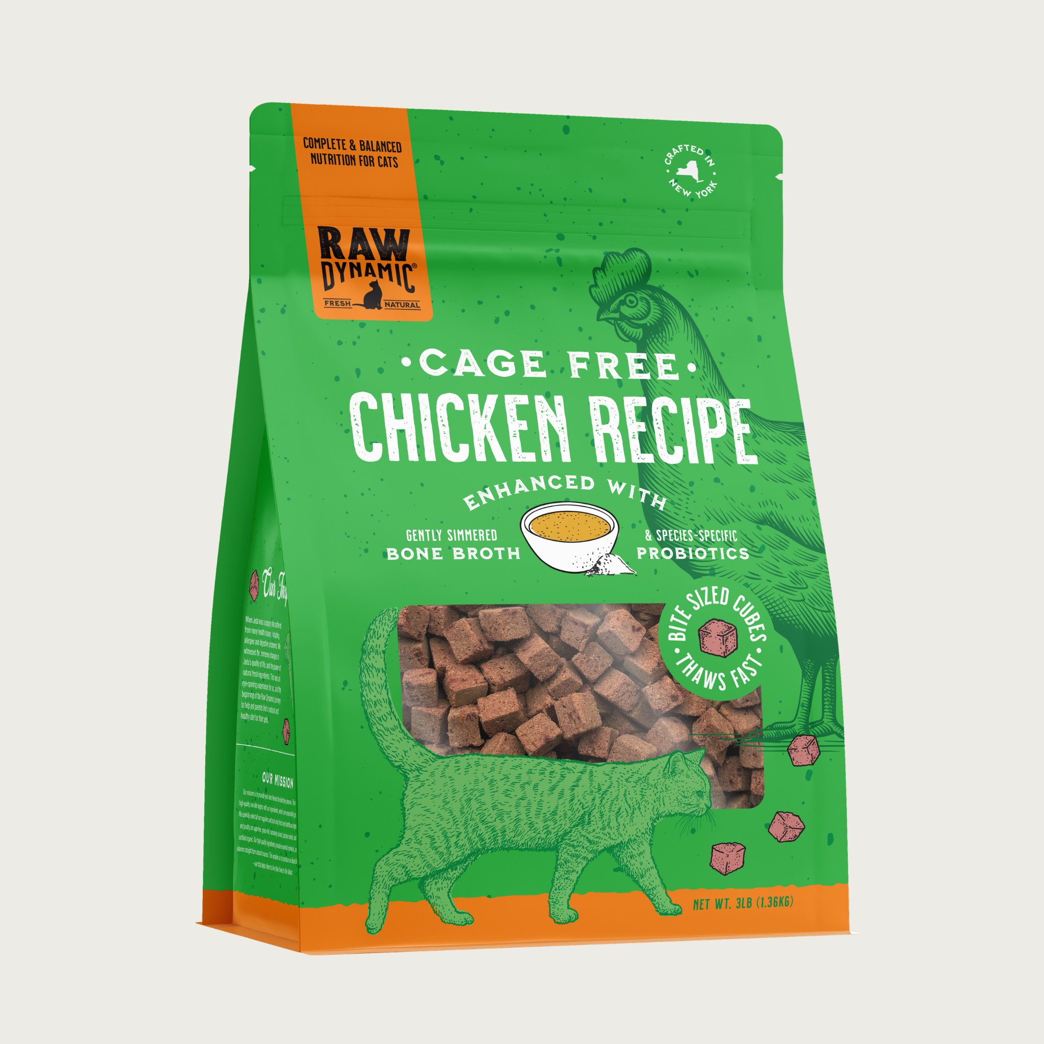 Raw Dynamic Cage Free Chicken frozen raw cat food in a green bag. Enhanced with gently simmered bone broth & species-specific probiotics. Bite sized cubes - thaws fast. Clear window shows tiny cubes of reddish-brown food. Net wt. 3lbs.