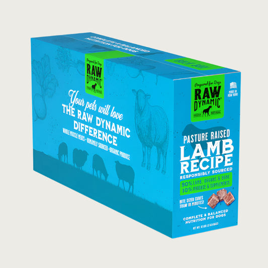 Raw Dynamic Frozen Raw Lamb dog food in a light blue box, made from pasture raised lamb, grain-free, all-natural, and rich in protein for healthy dogs. Packaged in a twelve pound box.