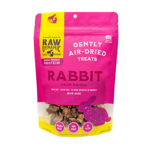 Raw Dynamic Air Dried Rabbit treats for dogs and cats in a small pink bag, made from farm raised rabbit, grain-free, all-natural, and rich in protein for healthy pets. Bite sized treats.