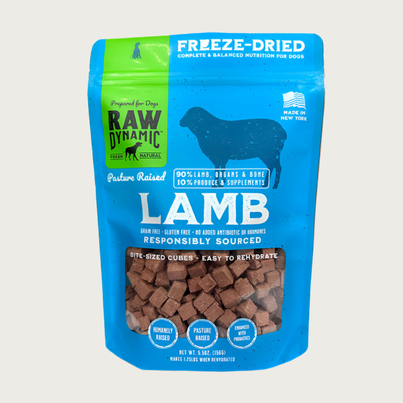 Raw Dynamic Raw Lamb freeze-dried dog food in a light blue bag, made from pasture raised lamb, grain-free, all-natural, and rich in protein for healthy dogs.