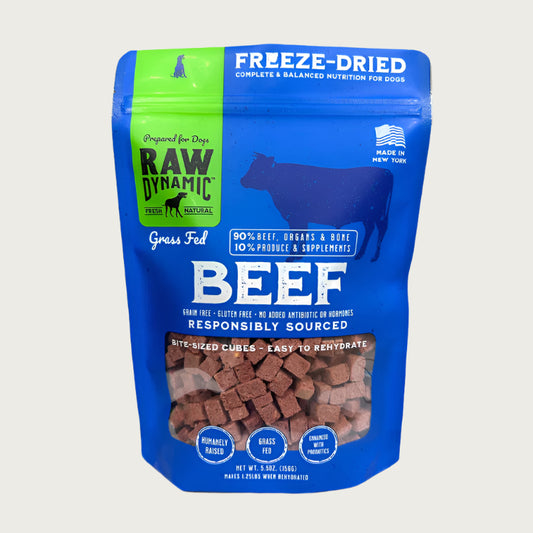 Raw Dynamic Raw Beef freeze-dried dog food in a blue bag, made from grass fed beef, grain-free, all-natural, and rich in protein for healthy dogs.