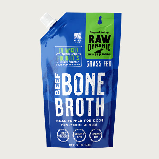 Raw Dynamic Beef Bone Broth for dogs in a blue pouch, featuring grass fed beef  ingredients packed with probiotics and nutrients, ideal as a healthy meal topper for dogs.
