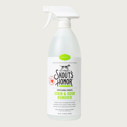 Plastic spray bottle of Skout's Honor Professional Strength Stain & Odor Remover. Works fast to remove stains & odors including urine, feces, blood, mud, grease & wine. Safe for pets, family & home (when used as directed). Net Wt. 35 Fluid Oz.