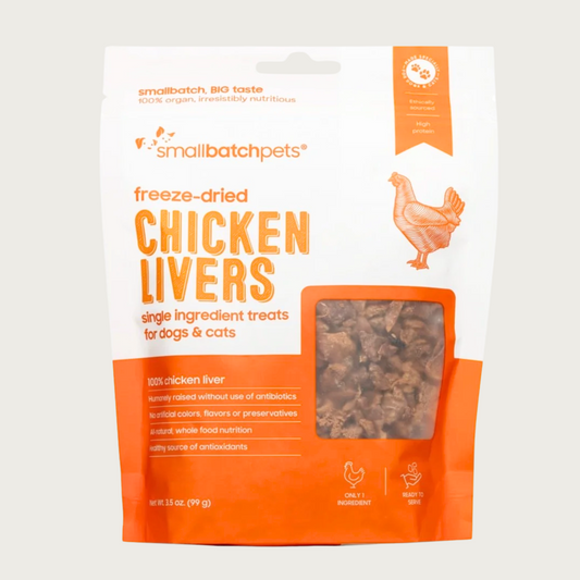 Orange & white bag of smallbatch freeze-dried chicken livers treats for dogs and cats. There is a small, transparent window showing product inside. They are small brown pieces.