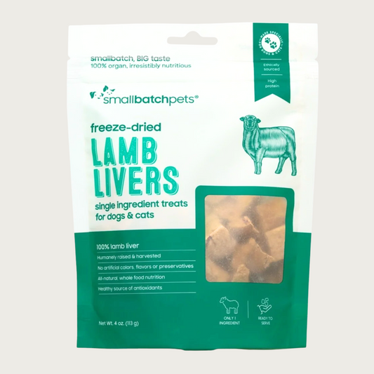Deep green & white bag of smallbatch freeze-dried lamb livers treats for dogs and cats. There is a small, transparent window showing product inside. They are small brown pieces.