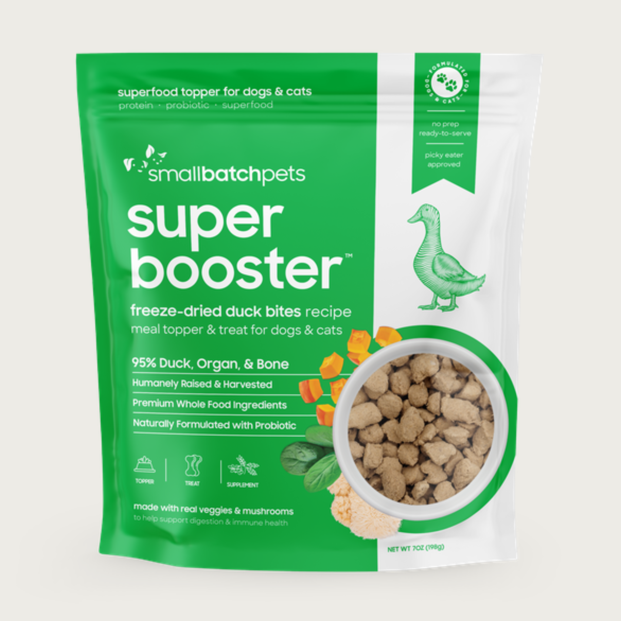 A green and white, 7 ounce bag of Smallbatch Super Booster freeze-dried raw duck bites recipe for dogs and cats. Can be used as a meal topper or treat. The bag has a small, clear window showing bite-sized treat pieces, about 1/2" to 1" long.