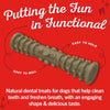 Close-up photo of one brownish-colored treat is in the center on a red background; it looks like a narrow stick-like hourglass with ridges and bumps. Text says "Putting the fun in functional"; easy to roll and easy to hold. Natural dental treats for dogs that help clean teeth and freshen breath, with an engaging shape & delicious taste.