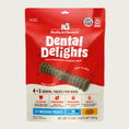 Load image into Gallery viewer, 23.2 oz bag of Stella & Chewy's Dental Delights, 4-in-1 Dental Treats for Dogs. Cleans, Freshens, Engages, Tasty. Contains 27 Medium treats for dogs between 26-50 lbs. Photo of one treat is in the center; it looks like a narrow stick-like hourglass with ridges and bumps.
