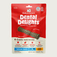 Load image into Gallery viewer, 5.5 oz bag of Stella & Chewy's Dental Delights, 4-in-1 Dental Treats for Dogs. Cleans, Freshens, Engages, Tasty. Contains 7 Medium treats for dogs between 26-50 lbs. Photo of one treat is in the center; it looks like a narrow stick-like hourglass with ridges and bumps.
