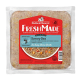A 16 oz clear pouch of Stella & Chewy's FreshMade Gently Cooked Savory Sea dog food. Product is visible around the centered red label, and looks like finely ground fish with chopped vegetables.