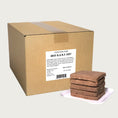 Load image into Gallery viewer, A 20 pound bulk box of Steve's Real Food frozen raw food 8 ounce patties in the beef recipe for both dogs and cats. A plate of the bar shaped patties is positioned in front of the box for reference.
