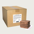 Load image into Gallery viewer, A 20 pound bulk box of Steve's Real Food frozen raw food 8 ounce patties in the turducken (turkey, duck, and chicken) recipe for both dogs and cats. A plate of the bar shaped patties is positioned in front of the box for reference.

