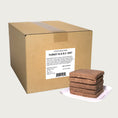 Load image into Gallery viewer, A 20 pound bulk box of Steve's Real Food frozen raw food 8 ounce patties in the turkey recipe for both dogs and cats. A plate of the bar shaped patties is positioned in front of the box for reference.
