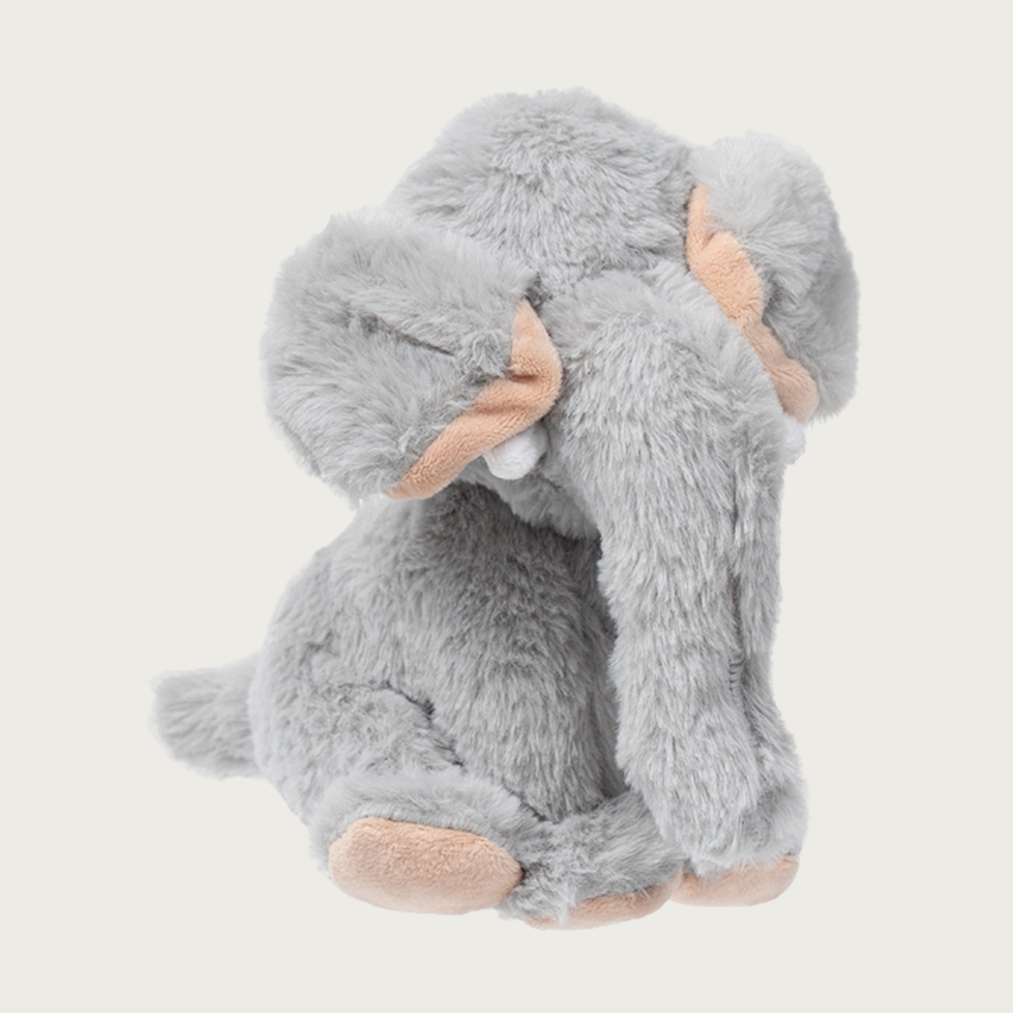 Alternate view of the Animated Elephant toy, showing its ears covering its face when it's not being squeezed.