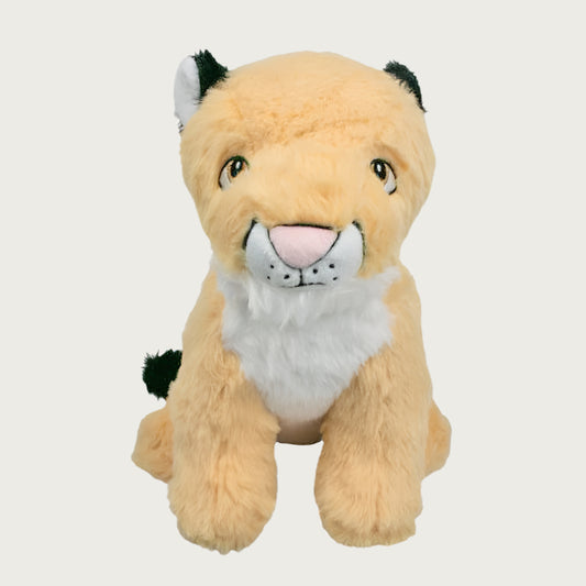 Front view of the Crunch Mountain Lion dog toy It has beige plush fur with white chest, muzzle and inner ears. Black tips on its tail and outer ears. Embroidered eyes and snout give it a cute expression.