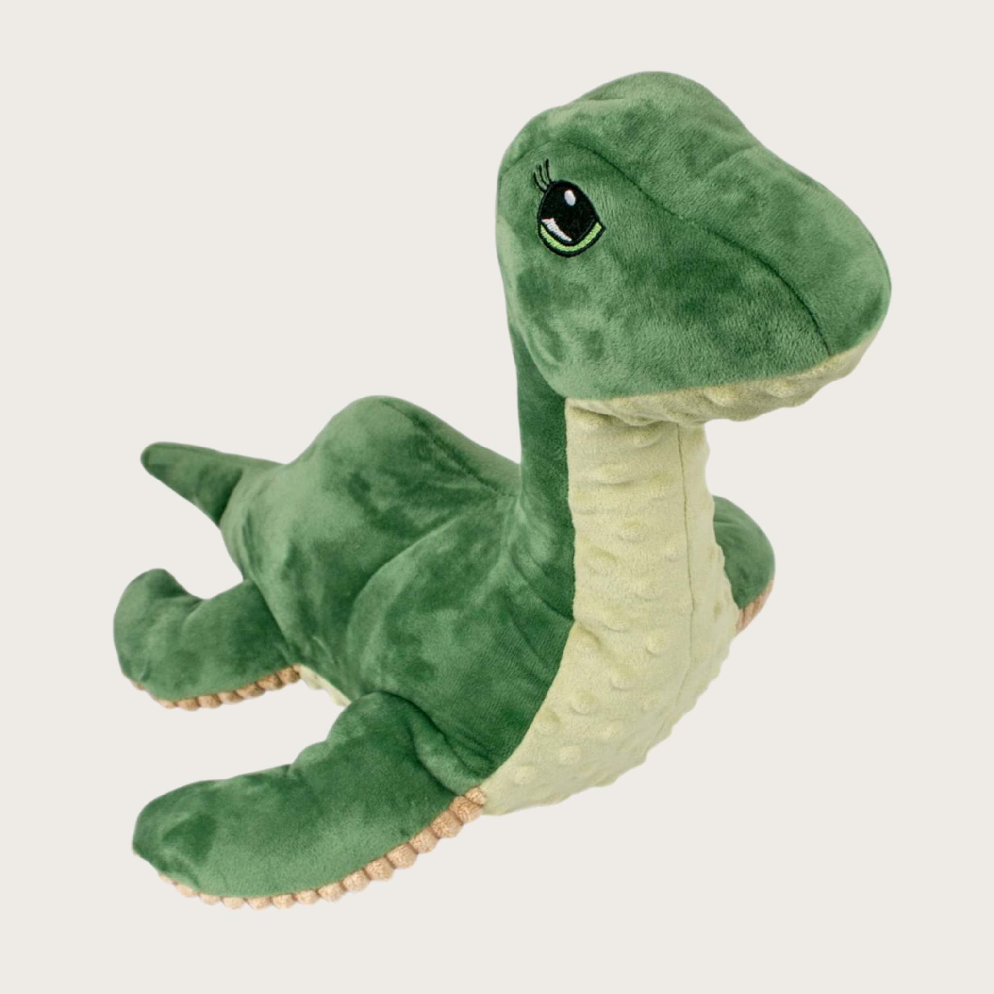 Two-toned green plush Nessie dog toy. It resembles a swimming dinosaur, with wide front and back flippers and tail. It has large, cute embroidered eyes with eyelashes.