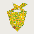 Load image into Gallery viewer, Reverse side of the Bunny Garden bandana. Base color is bright yellow and features a multicolored pansy floral pattern.
