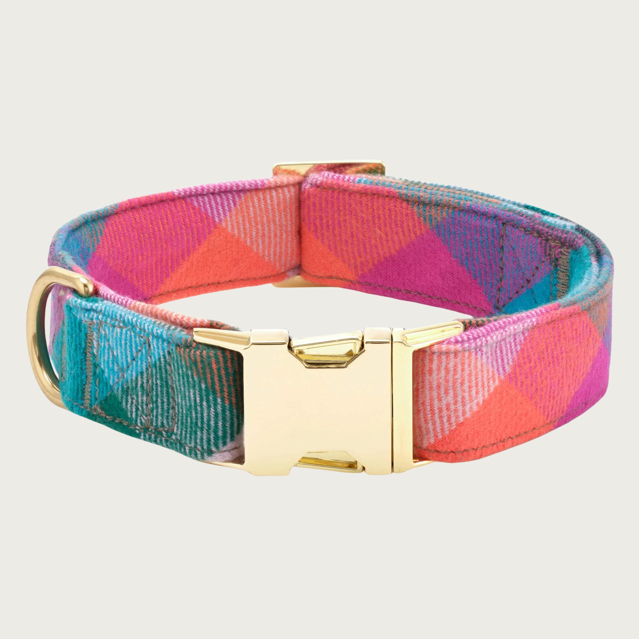 Colorful plaid dog collar in bright shades of teal, pink, purple, blue and orange. Gold-toned metal buckle and D-ring.