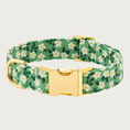 Load image into Gallery viewer, Medium green colored dog collar with a mini white & yellow daisy print accented with dark green leaves. Collar features gold-toned metal hardware.
