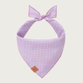 Load image into Gallery viewer, Reverse side of the Easter Eggs dog bandana. It is pale lilac in color with tiny white polka dots.
