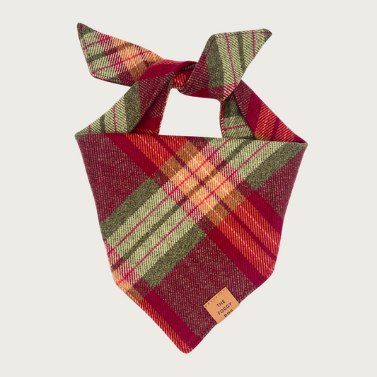 Plaid dog bandana in autumn shades of olive green, burgundy, and orange.
