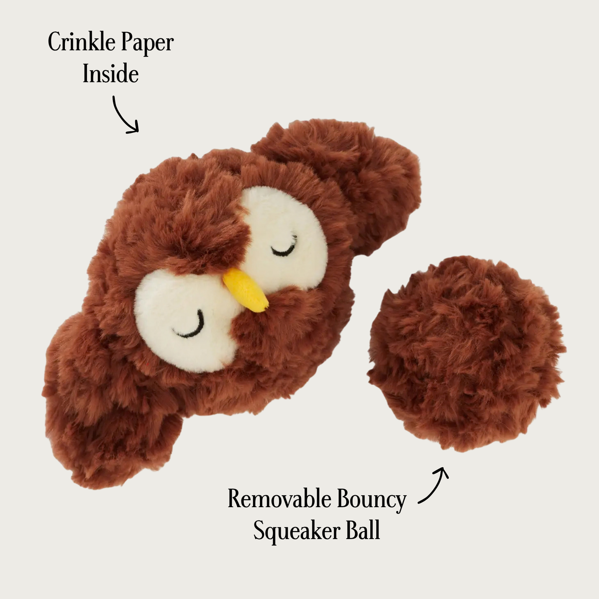 Plush 2-in-1 owl ball dog toy, with removable bouncy squeaker ball next to it. Ball has matching fluffy brown plush covering it. Text pointing to the owl says "crinkle paper inside" and text pointing to the ball says "removable bouncy squeaker ball".