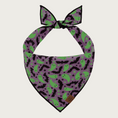 Load image into Gallery viewer, Night view of the bandana when it's glowing in the dark. Ghosts turn a bright green color.

