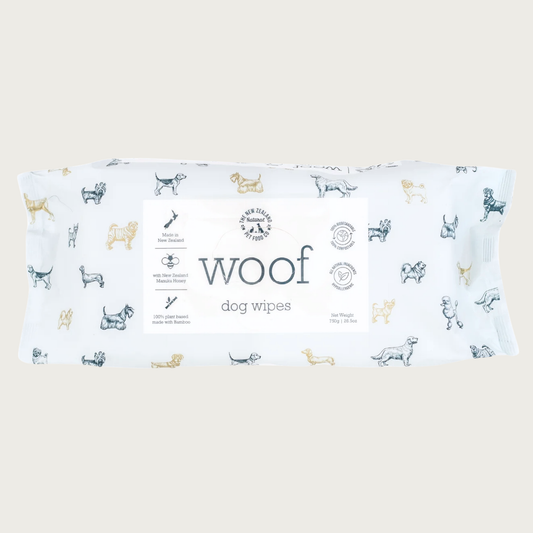 White package of Woof Dog Wipes with dog illustrations. Net Weight 750g/26.5oz.
