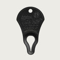 Load image into Gallery viewer, Small, pie-slice shaped Original Tick Key in matte black. Small hole on top for attaching to a keychain. Larger, tapered raindrop sized hole on the bottom, for removing tick.
