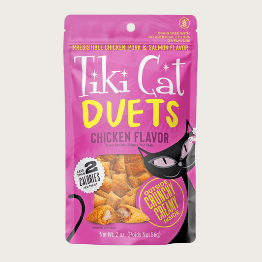 Tiki Cat Duets Chicken Flavor cat treats in a hot pink pouch. Grain free with no artificial colors or flavors. Irresistible chicken, pork & salmon flavor. 