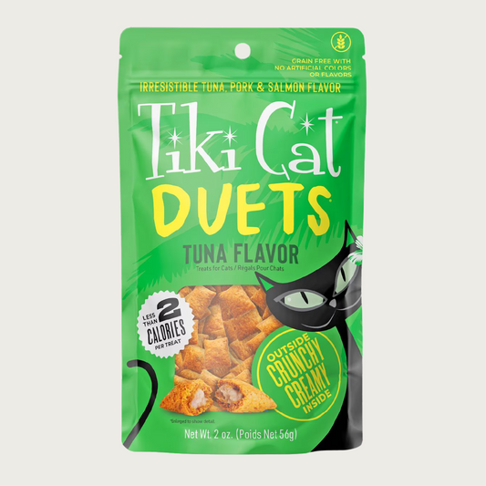 Tiki Cat Duets Tuna Flavor cat treats in a bright green pouch. Grain free with no artificial colors or flavors. Irresistible tuna, pork & salmon flavor. 