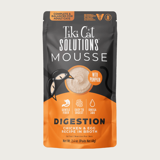 A 2.4 oz orange & black pouch of Tiki Cat Solutions Mousse Digestion - Chicken & Egg Recipe in Broth. Text highlights: Gentle Fiber, Easy to Digest, Omega 3 & 6. Complete & Balanced for Adult Cats. Reviewed & recommended by Tiki Cat Veterinary Nutritionists.