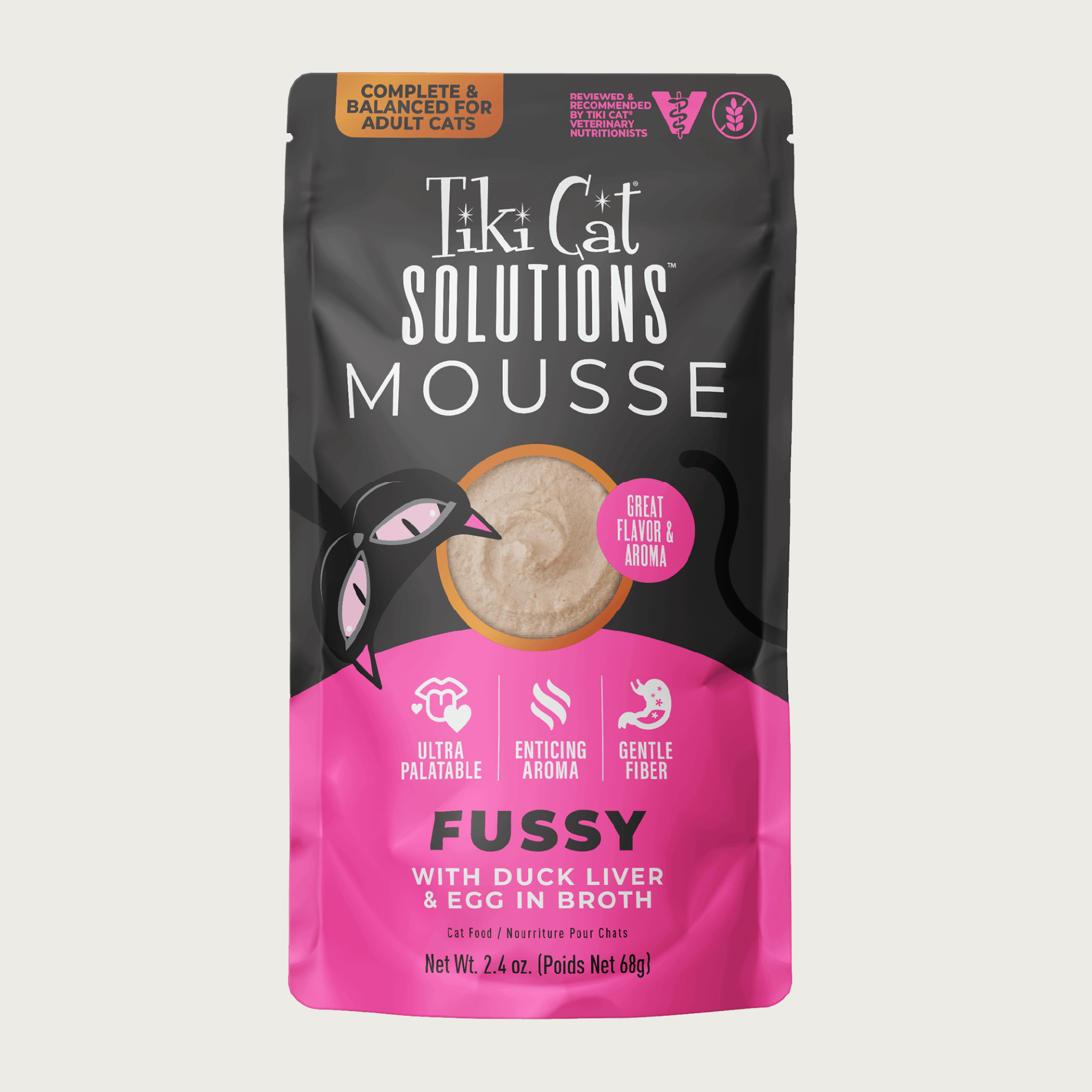 A 2.4 oz hot pink & black pouch of Tiki Cat Solutions Mousse Fussy - with Duck Liver & Egg in Broth. Text highlights: Ultra Palatable, Enticing Aroma, Gentle Fiber. Complete & Balanced for Adult Cats. Reviewed & recommended by Tiki Cat Veterinary Nutritionists.