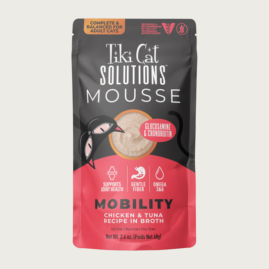 A 2.4 oz red & black pouch of Tiki Cat Solutions Mousse Mobility - Chicken & Tuna Recipe in Broth. Text highlights: Supports Joint Health, Gentle Fiber, Omega 3 & 6. Complete & Balanced for Adult Cats. Reviewed & recommended by Tiki Cat Veterinary Nutritionists.