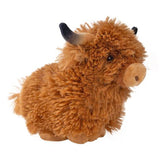 Side view of the shaggy highland cow dog toy, which shows its short and compact body.