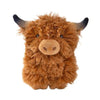 A cute highland cow dog toy, with horns, snout and feet. Covered in caramel colored shaggy plush fabric.