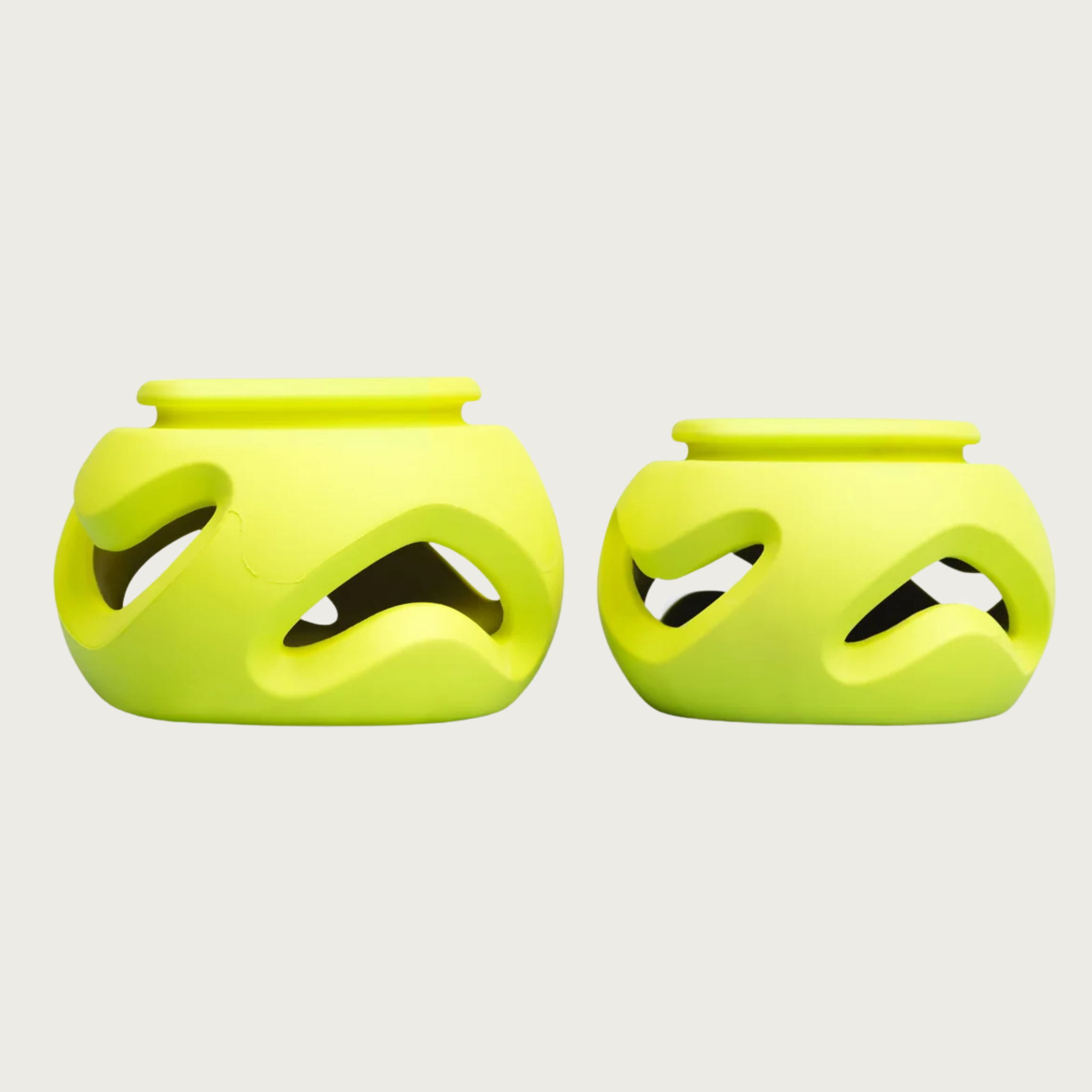 Both sizes of The Boomerang dog toy, side by side to show size difference.