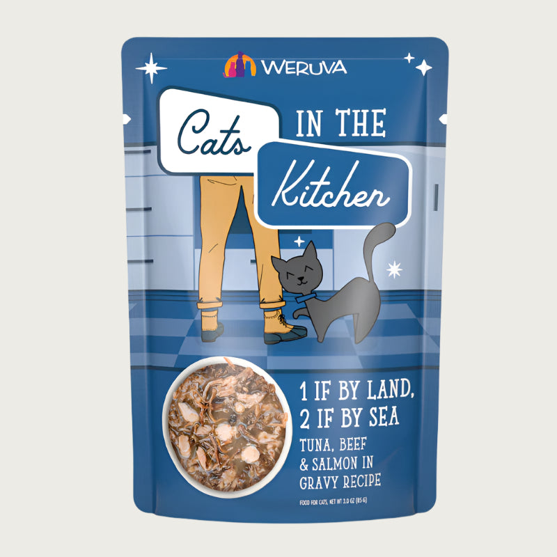 A 3 oz blue pouch of Weruva Cats in the Kitchen, 1 If By Land, 2 If By Sea, tuna, beef & salmon in gravy recipe wet food for cats. Image on pouch shows actual food, which is chunks of tuna and salmon, and shredded beef.