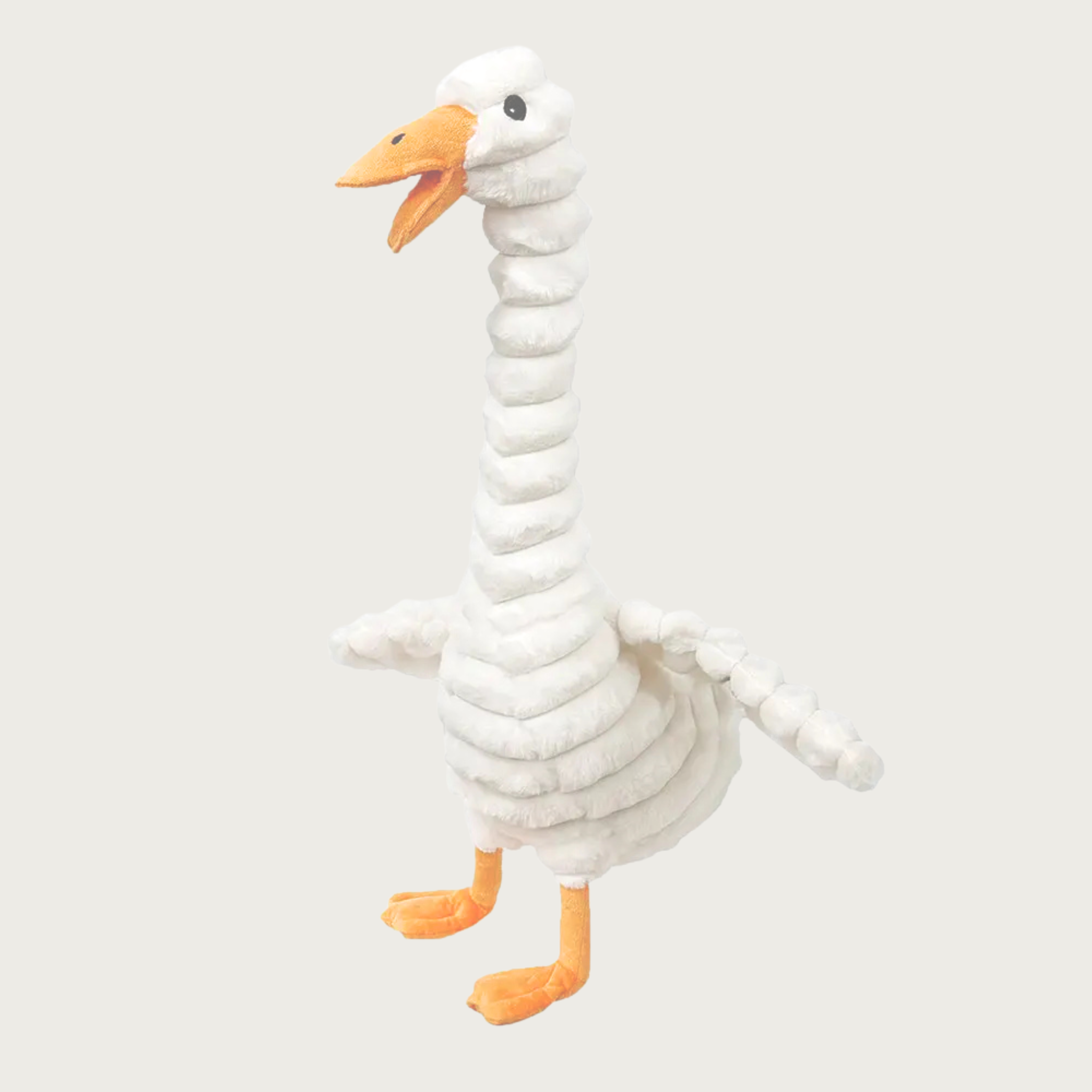 Plush duck dog toy with thick white corduroy body, orange beak and feet and embroidered facial details.