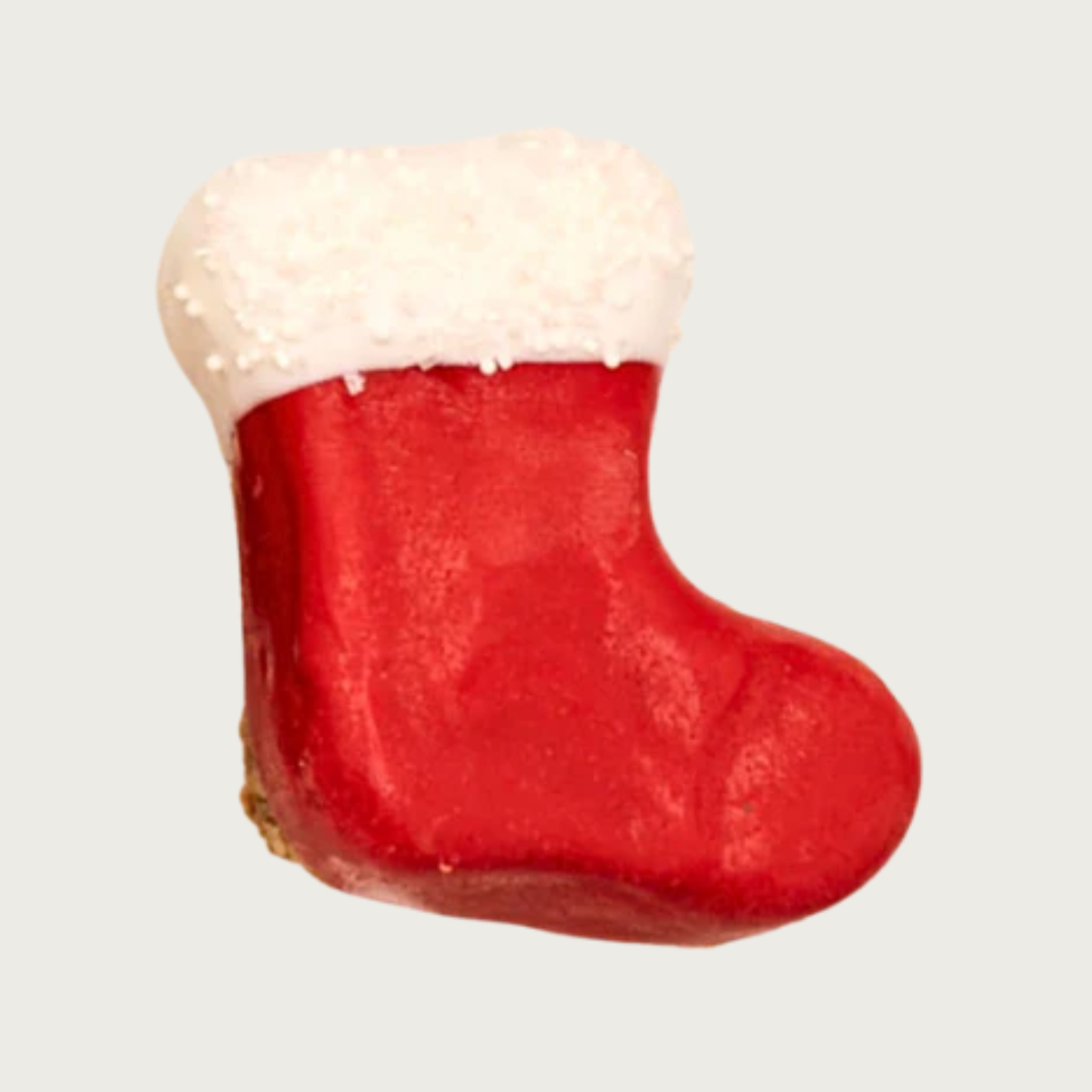Dog cookie in the shape of a red Christmas stocking with white cuff.