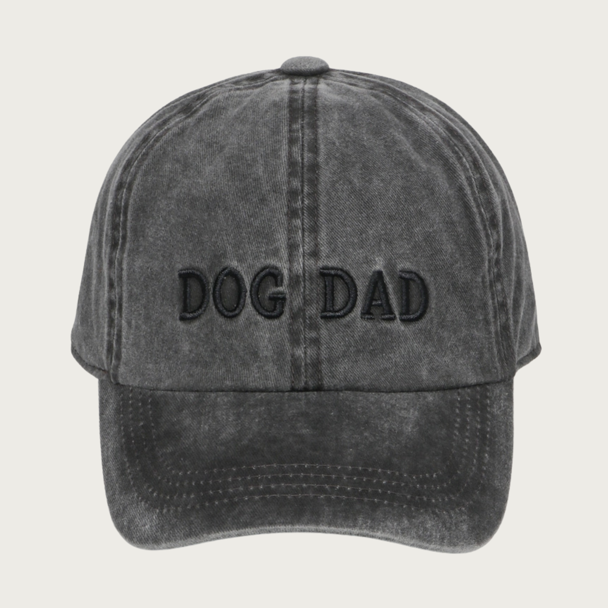 Vintage washed black cap with 'DOG DAD' in black all-caps text. Cap looks dark gray due to the washed effect.