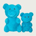 Load image into Gallery viewer, Two plush turquoise blue gummy bear shaped dog toys, side by side to show size difference.
