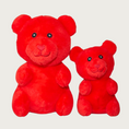 Load image into Gallery viewer, Two plush red gummy bear shaped dog toys, side by side to show size difference.
