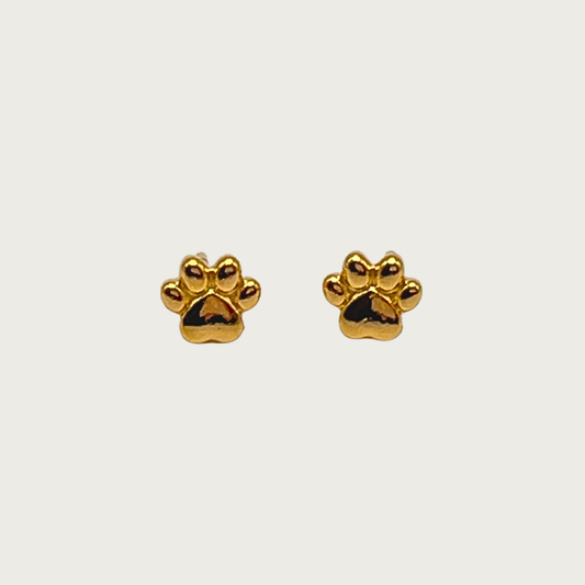 Gold toned paw print shaped stud earrings.