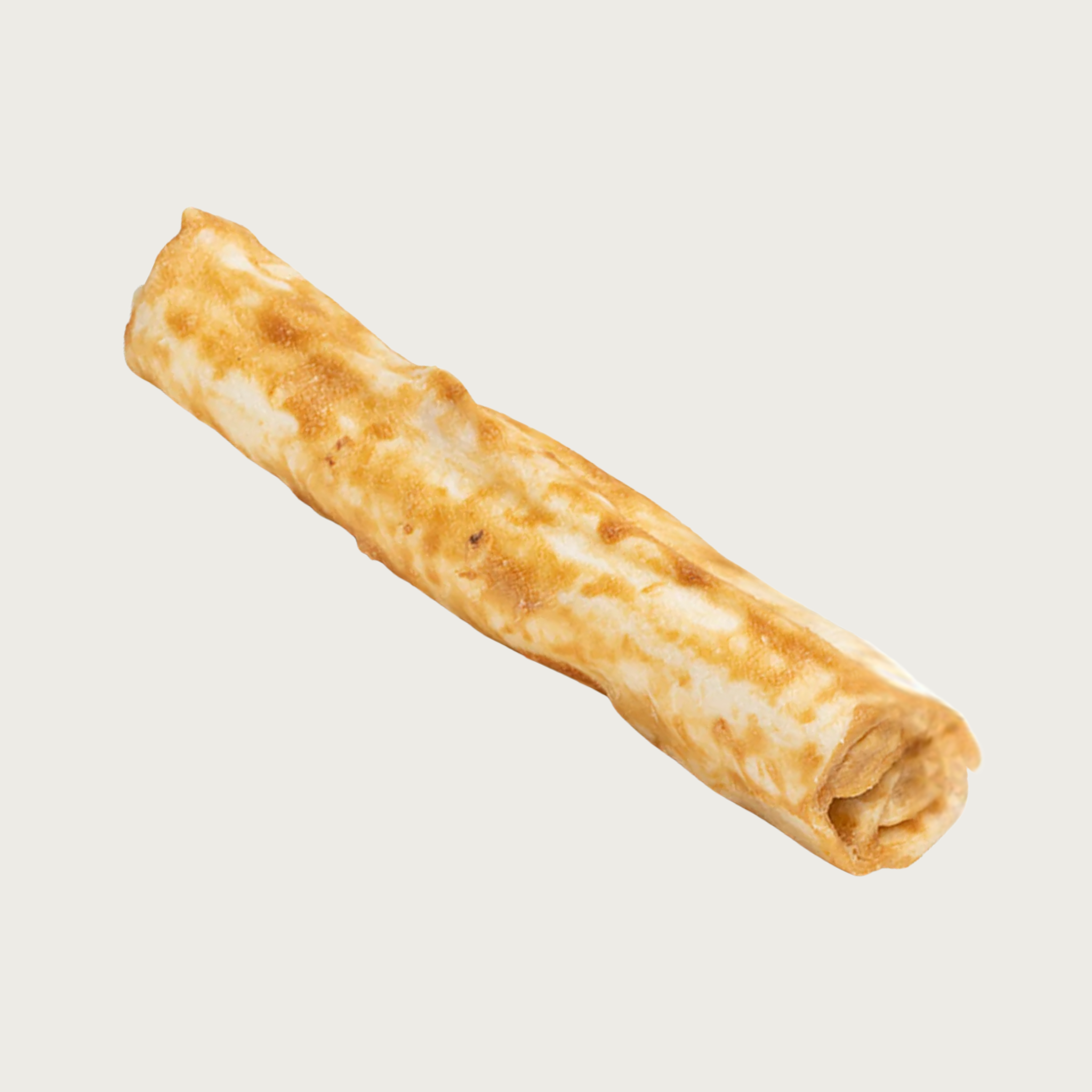 An example of the No-Hide Wrap chew for dogs. All flavors look similar.  It is a rolled, straight shaped chew, with the flavor topping smeared across it. Base color is light tan, "smear" ranges from light tan to light brown.