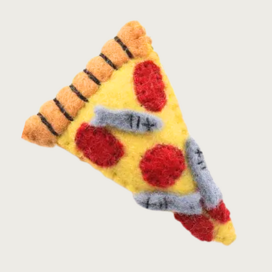 Wool cat toy in the shape of a pizza slice. It has tan "crust", yellow "cheese", red "pepperoni" and gray "anchovies".