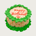 Load image into Gallery viewer, Small round dog/cat cake with green frosting on the edges, with 'Happy Birthday' written on top with a pawprint.
