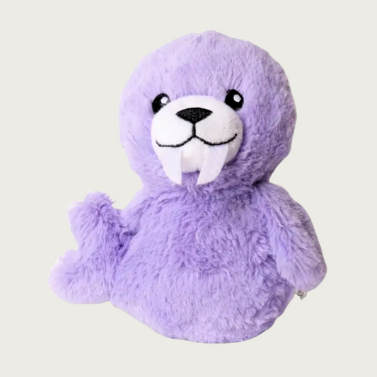 Plush, light purple walrus dog toy. It has a smiling expression, and two thin, fabric tusks.